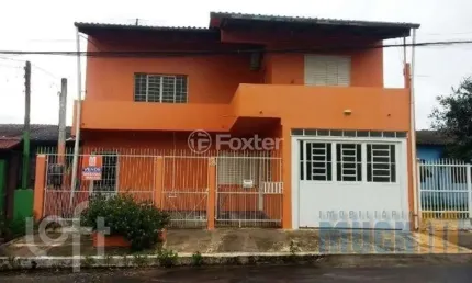 Casa com 4 quartos à venda na Quadra R Três, 28, Guajuviras, Canoas, 200 m2 por R$ 350.000