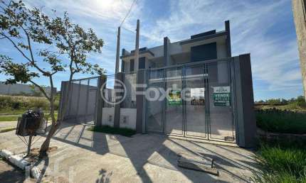 Casa com 3 quartos à venda na Rua San Marino, 18, Marechal Rondon, Canoas, 169 m2 por R$ 1.290.000