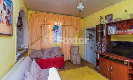 Casa com 3 quartos à venda na Rua Coronel Tisiano F. de Leoni, 240, Coronel Aparício Borges, Porto Alegre, 308 m2 por R$ 305.000