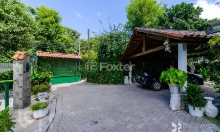 Casa em condomínio fechado com 5 quartos à venda na Rua Hygino Russi Lima, 420, Ponta Grossa, Porto Alegre, 170 m2 por R$ 1.700.000