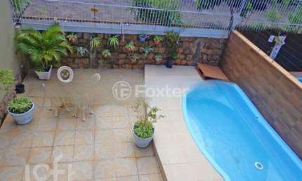 Casa com 3 quartos à venda na Acesso A, 89, Hípica, Porto Alegre, 210 m2 por R$ 958.000
