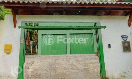 Casa com 4 quartos à venda na Servidão Recanto da Pedra, 3, Rio Tavares, Florianópolis, 396 m2 por R$ 1.900.000