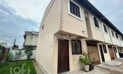 Casa em condomínio fechado com 3 quartos à venda na Rua Vereador Adão Da Silva Santos, 230, São José, Canoas, 112 m2 por R$ 500.000