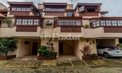 Casa em condomínio fechado com 3 quartos à venda na Avenida Wenceslau Escobar, 3714, Vila Conceição, Porto Alegre, 137 m2 por R$ 690.000