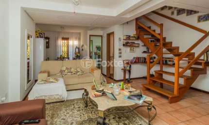 Casa em condomínio fechado com 3 quartos à venda na Avenida da Cavalhada, 6347, Cavalhada, Porto Alegre, 115 m2 por R$ 480.000