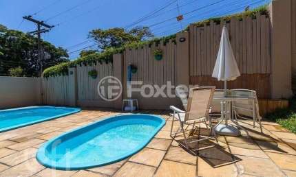 Casa em condomínio fechado com 3 quartos à venda na Rua Humberto de Campos, 601, Partenon, Porto Alegre, 96 m2 por R$ 430.000