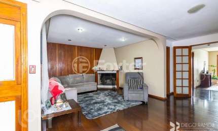 Casa com 4 quartos à venda na Rua Erechim, 1025, Nonoai, Porto Alegre, 358 m2 por R$ 880.000