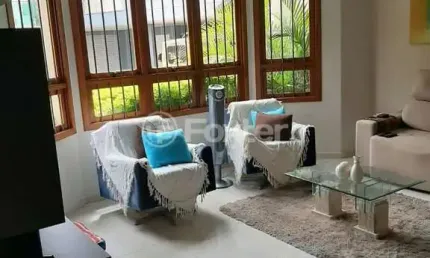 Casa em condomínio fechado com 3 quartos à venda na Rua Dois Mil Novecentos e Noventa e Nove, 356, Mário Quintana, Porto Alegre, 200 m2 por R$ 1.200.000