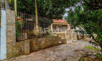 Casa com 3 quartos à venda na Rua Fagundes Varela, 153, Santo Antônio, Porto Alegre, 300 m2 por R$ 1.250.000