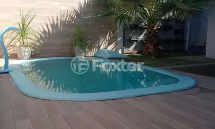Casa em condomínio fechado com 3 quartos à venda na Rua Walter Porto Filho, 81, Mário Quintana, Porto Alegre, 170 m2 por R$ 600.000