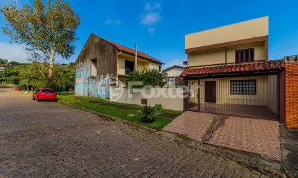 Casa com 2 quartos à venda na Rua Ari Peixoto Martins, 51, Espírito Santo, Porto Alegre, 128 m2 por R$ 480.000