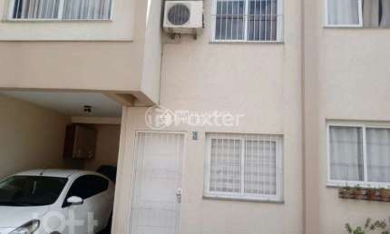 Casa em condomínio fechado com 3 quartos à venda na Rua Santa Terezinha, 477, Nossa Senhora das Graças, Canoas, 99 m2 por R$ 468.000