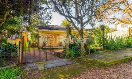 Casa com 4 quartos à venda na Rua Hygino Russi Lima, 290, Ponta Grossa, Porto Alegre, 150 m2 por R$ 220.000