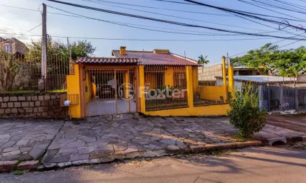 Casa com 3 quartos à venda na Avenida Delmar Rocha Barbosa, 699, Parque Santa Fé, Porto Alegre, 103 m2 por R$ 650.000