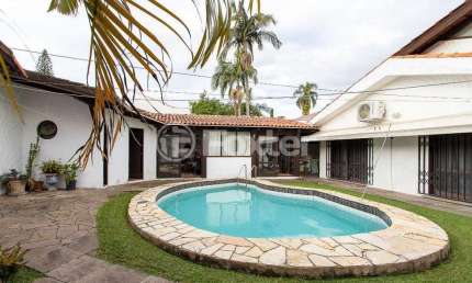 Casa com 3 quartos à venda na Rua Morano Calabro, 116, Jardim Isabel, Porto Alegre, 357 m2 por R$ 1.490.000