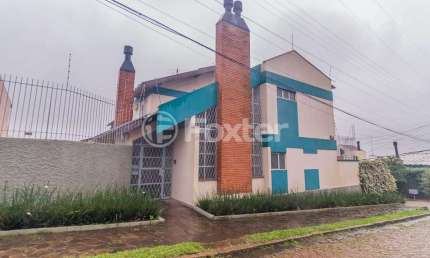 Casa com 4 quartos à venda na Rua Ivan Iglesias, 216, Jardim Itu Sabará, Porto Alegre, 177 m2 por R$ 650.000