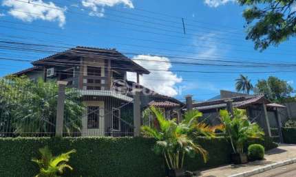Casa com 3 quartos à venda na Rua Borges de Medeiros, 61, Niterói, Canoas, 250 m2 por R$ 1.235.000