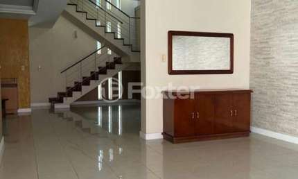Casa com 4 quartos à venda na Avenida Fábio Araújo Santos, 1164, Nonoai, Porto Alegre, 329 m2 por R$ 1.138.100
