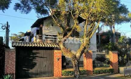 Casa em condomínio fechado com 3 quartos à venda na Avenida Guaíba, 10930, Ipanema, Porto Alegre, 190 m2 por R$ 750.000