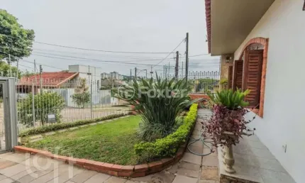 Casa com 3 quartos à venda na Rua Esteio, 221, Cavalhada, Porto Alegre, 297 m2 por R$ 810.000
