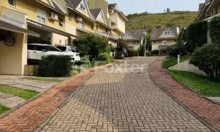 Casa em condomínio fechado com 3 quartos à venda na Avenida Engenheiro Ludolfo Boehl, 1179, Teresópolis, Porto Alegre, 200 m2 por R$ 1.050.000