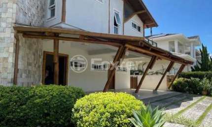 Casa em condomínio fechado com 4 quartos à venda na Rodovia Doutor Antônio Luiz Moura Gonzaga, 3801, Rio Tavares, Florianópolis, 450 m2 por R$ 4.900.000