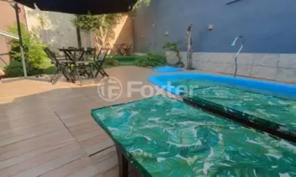 Casa com 4 quartos à venda na Rua Waldemar Guido Vicentini, 364, Dom Feliciano, Gravataí, 266 m2 por R$ 1.050.000