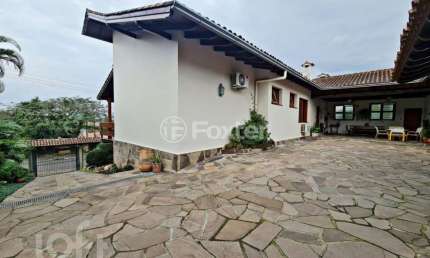 Casa com 4 quartos à venda na Rua Frederico Groehs Neto, 180, Vila Nova, Novo Hamburgo, 427 m2 por R$ 1.250.000