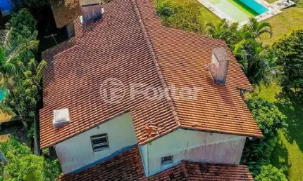 Casa em condomínio fechado com 5 quartos à venda na Avenida Firmino Octávio Bimbi, 255, Cavalhada, Porto Alegre, 400 m2 por R$ 1.800.000