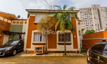 Casa em condomínio fechado com 3 quartos à venda na Rua Tenente Ary Tarrago, 1720, Jardim Itu Sabará, Porto Alegre, 85 m2 por R$ 415.000