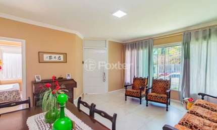 Casa com 4 quartos à venda na Rua Adão Baino, 485, Cristo Redentor, Porto Alegre, 201 m2 por R$ 1.200.000