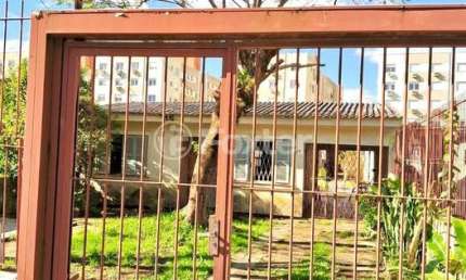 Casa com 5 quartos à venda na Rua Nove de Junho, 176, Vila São José, Porto Alegre, 139 m2 por R$ 594.000