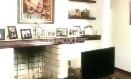 Casa com 5 quartos à venda na Avenida General Barreto Viana, 329, Chácara das Pedras, Porto Alegre, 550 m2 por R$ 1.800.000