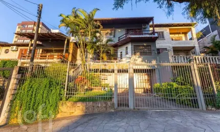 Casa com 6 quartos à venda na Rua Fernando Abbott, 1055, Cristo Redentor, Porto Alegre, 360 m2 por R$ 1.300.000