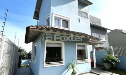 Casa com 3 quartos à venda na Rua Henrique Anawate, 470, Guarujá, Porto Alegre, 137 m2 por R$ 899.500