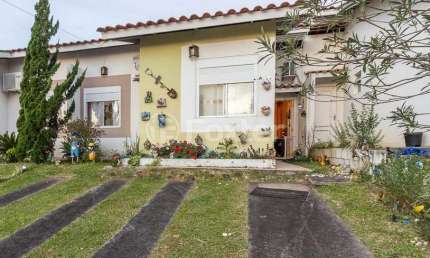 Casa em condomínio fechado com 2 quartos à venda na Avenida Terra Nova, 501, Terra Nova, Alvorada, 66 m2 por R$ 285.000
