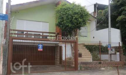Casa com 3 quartos à venda na Rua Vladimir Herzog, 35, Jardim Carvalho, Porto Alegre, 253 m2 por R$ 650.000