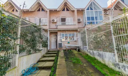 Casa com 2 quartos à venda na Rua Heitor Kramer, 324, Guarujá, Porto Alegre, 120 m2 por R$ 450.000