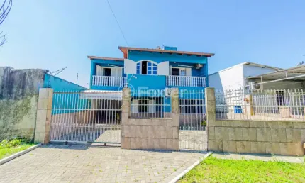 Casa com 3 quartos à venda na avenida rio dos sinos, 1960, harmonia, canoas, 200 m2 por r$ 600.000
