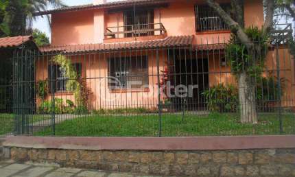 Casa com 5 quartos à venda na Rua Itapitocaí, 725, Cristal, Porto Alegre, 225 m2 por R$ 1.590.000