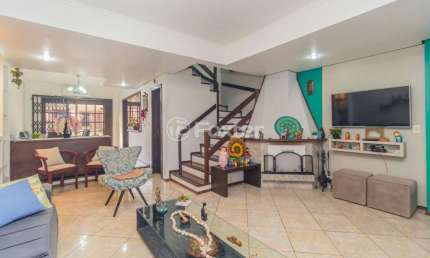 Casa com 3 quartos à venda na Rua Doutor Egydio Michaelsen, 62, Cavalhada, Porto Alegre, 197 m2 por R$ 700.000