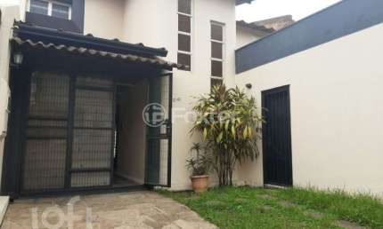 Casa com 4 quartos à venda na Rua Cláudio Manoel da Costa, 210, Jardim Itu Sabará, Porto Alegre, 300 m2 por R$ 900.000