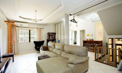 Casa com 5 quartos à venda na Rua Isidoro Tressi, 507, Jardim Botânico, Porto Alegre, 379 m2 por R$ 1.615.000
