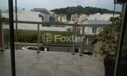 Casa com 3 quartos à venda na Rua Irmão Jaime Biazus, 83, Guarujá, Porto Alegre, 200 m2 por R$ 435.000