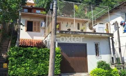 Casa com 3 quartos à venda na Rua Santiago Dantas, 398, Cascata, Porto Alegre, 160 m2 por R$ 299.000