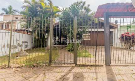 Casa com 3 quartos à venda na Rua Morano Calabro, 398, Jardim Isabel, Porto Alegre, 252 m2 por R$ 700.000