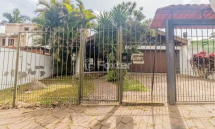Casa com 4 quartos à venda na Rua Morano Calabro, 398, Jardim Isabel, Porto Alegre, 252 m2 por R$ 700.000