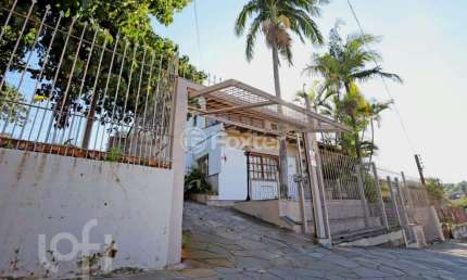 Casa com 4 quartos à venda na Rua João Bonuma, 110, Coronel Aparício Borges, Porto Alegre, 483 m2 por R$ 889.000