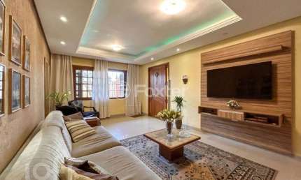 Casa com 3 quartos à venda na Rua Alterosa, 25, Jardim Carvalho, Porto Alegre, 464 m2 por R$ 1.400.000