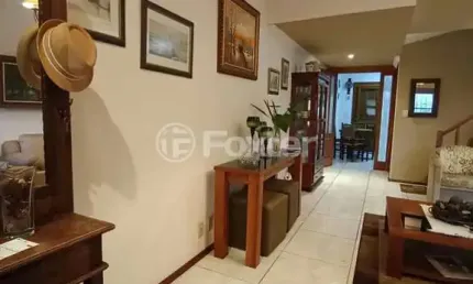 Casa com 2 quartos à venda na rua heitor kramer, 139, guarujá, porto alegre, 107 m2 por r$ 585.000